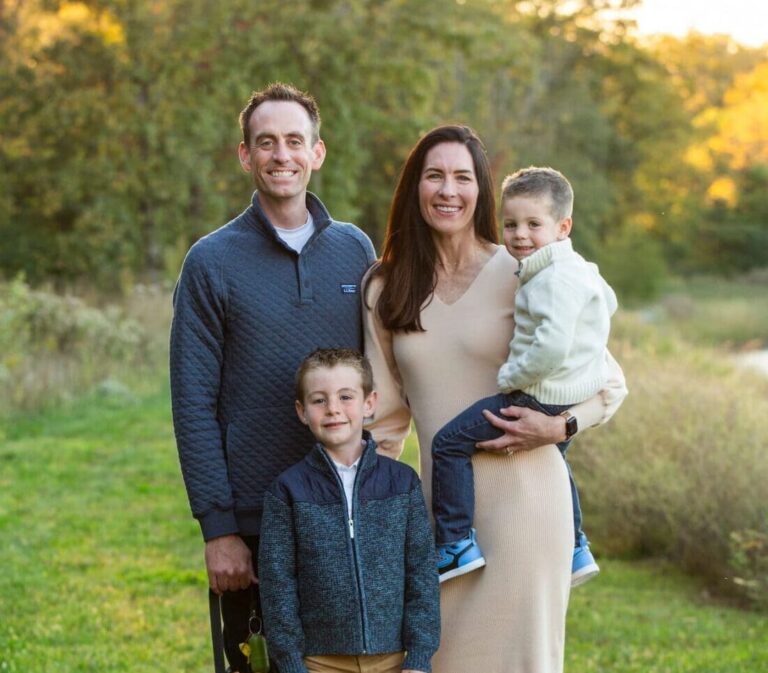A family of Dr. Jeffrey Lenius and their dog enjoy the outdoors, represent free orthodontic consultation at Lenius Orthodontics in Overland Park, KS.